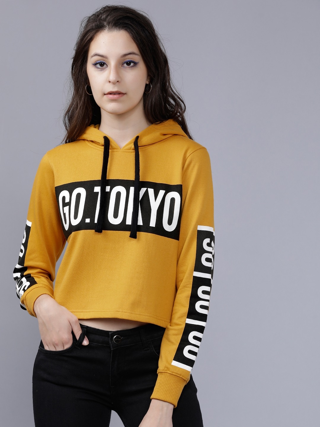 

Tokyo Talkies Women Yellow Printed Hooded Sweatshirt