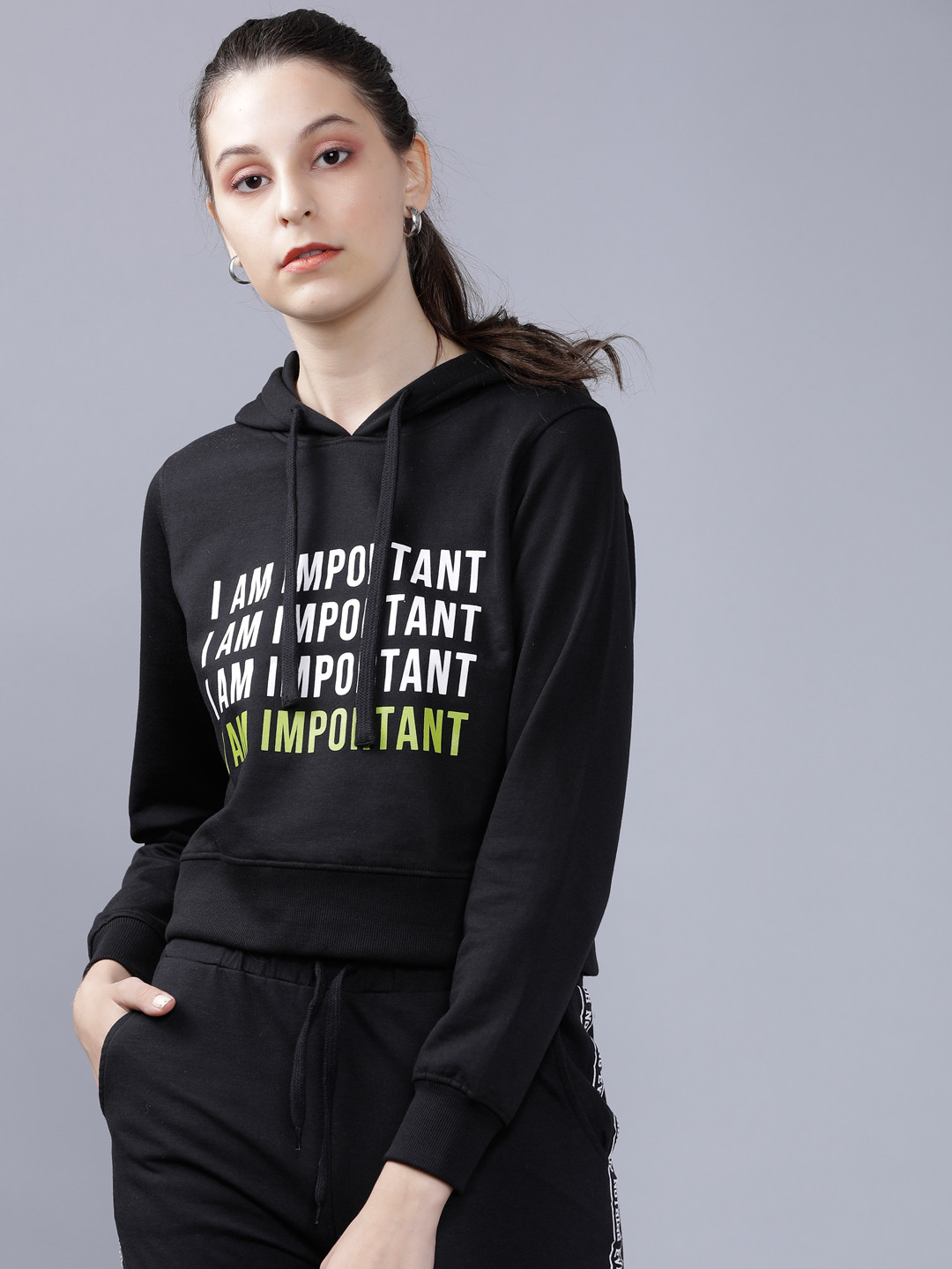 

Tokyo Talkies Women Black Printed Hooded Sweatshirt