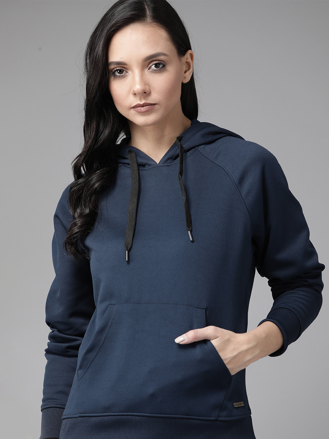 

Roadster Women Navy Blue Solid Hooded Sweatshirt Convertible Into a Bag