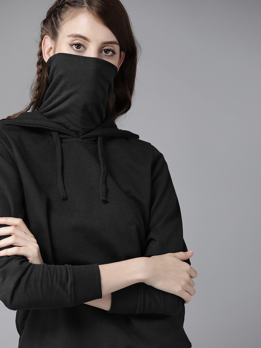 

Roadster Women Black Solid Hooded Sweatshirt