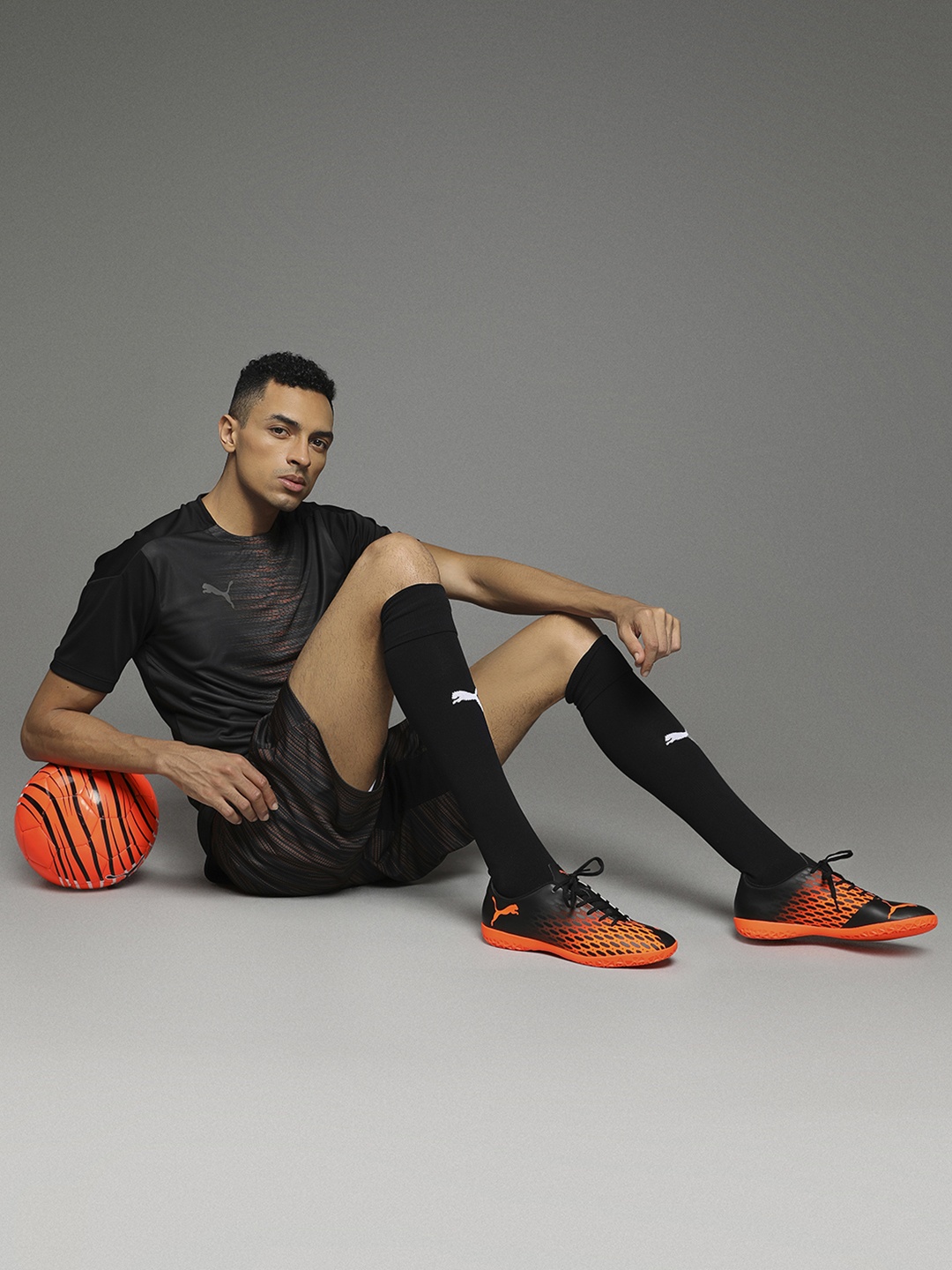 

Puma Men Black & Orange Spirit III IT Football Boots