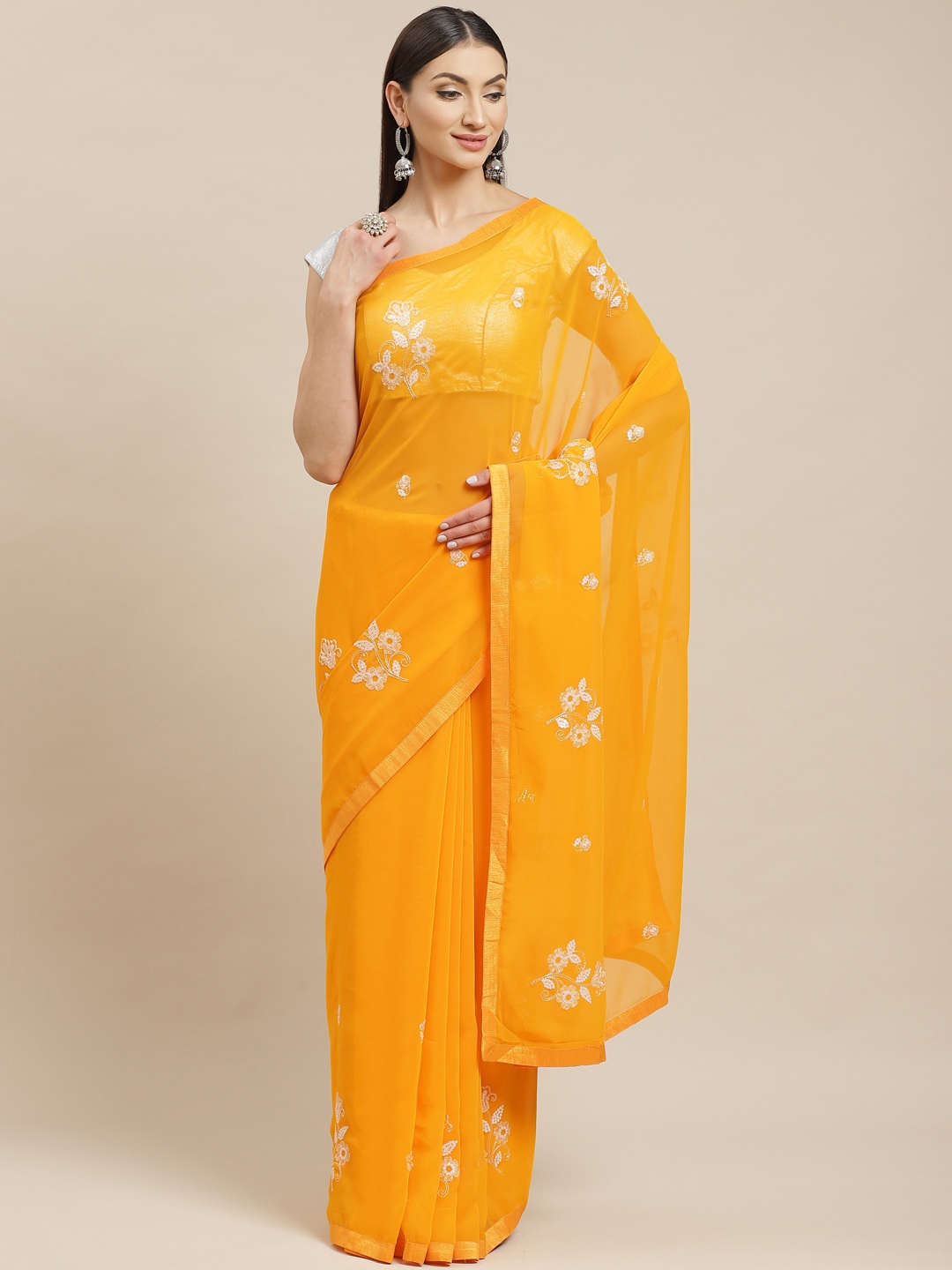 

Mitera Yellow & White Embroidered Saree
