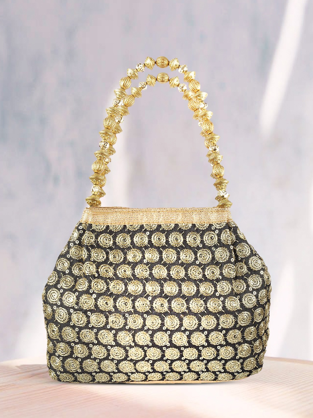 

Metro Black & Gold-Toned Self Design Handheld Bag