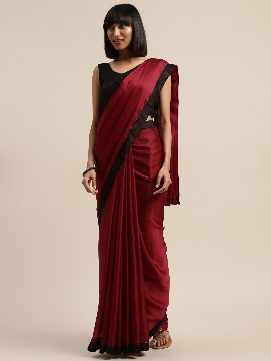 

Mitera Burgundy Solid Poly Chiffon Saree