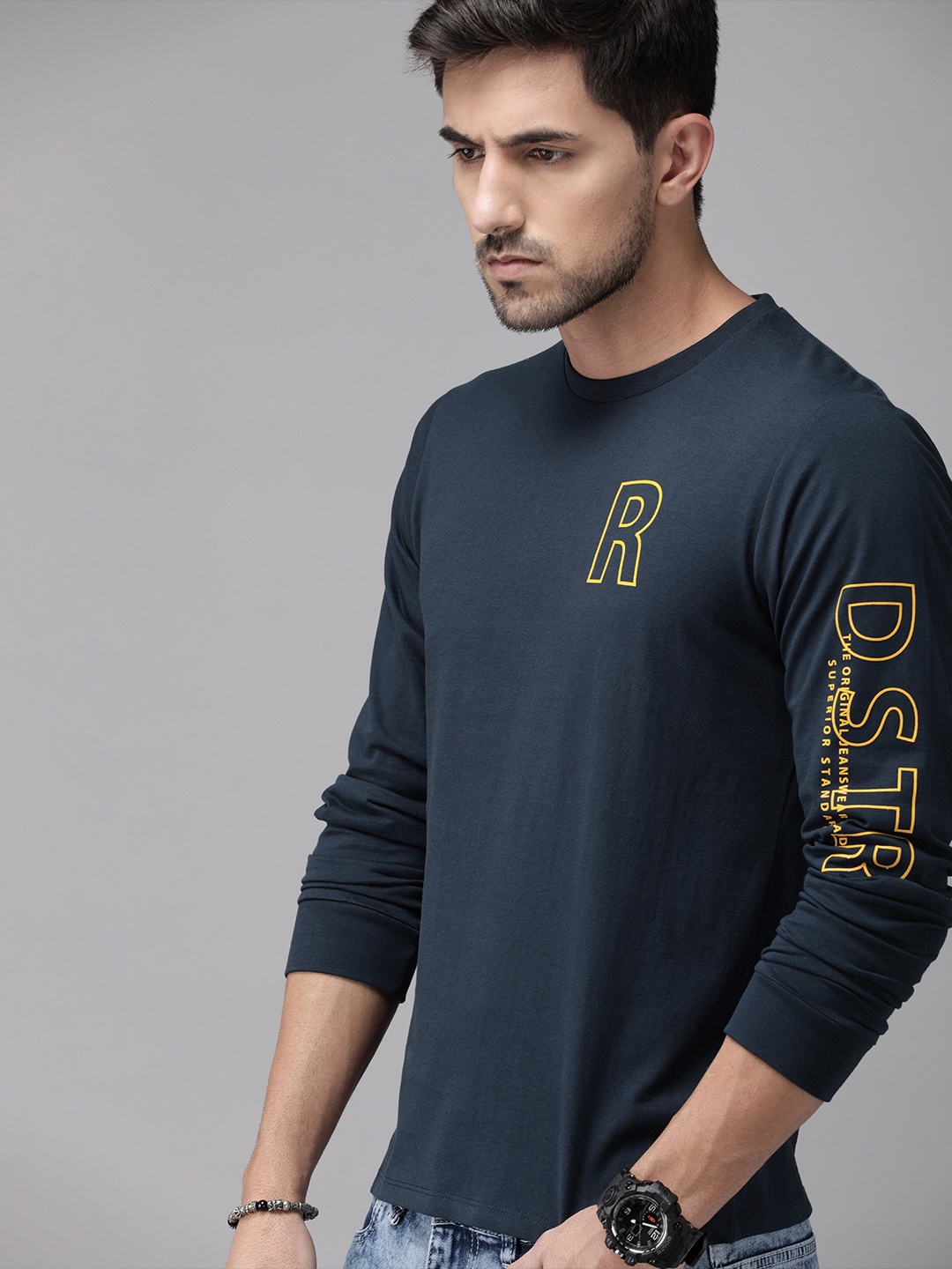 

Roadster Men Navy Blue Solid Round Neck Pure Cotton T-shirt with Printed Detail