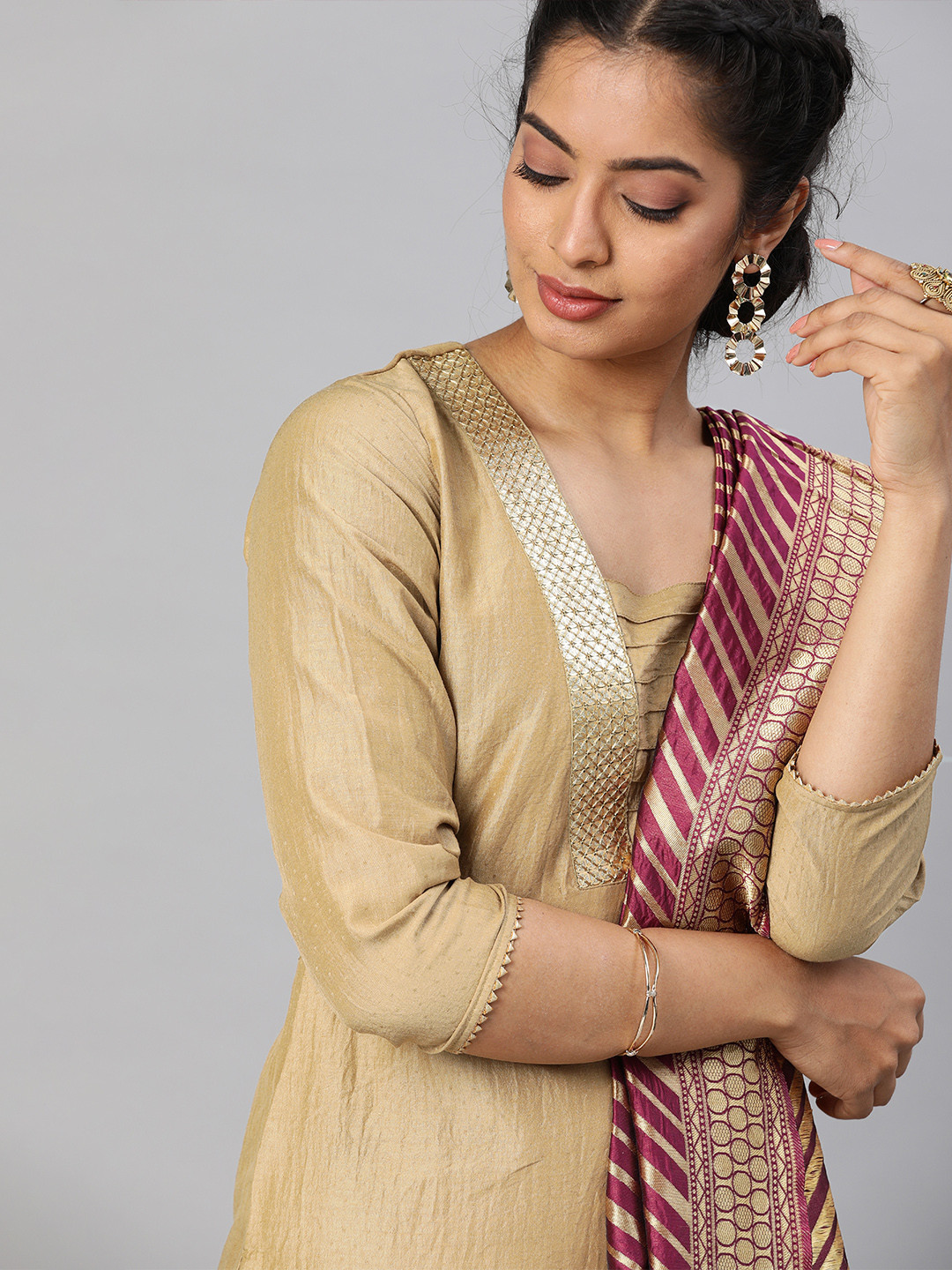 

Inddus Women Gold-Coloured & Purple Solid Kurta with Trousers & Dupatta