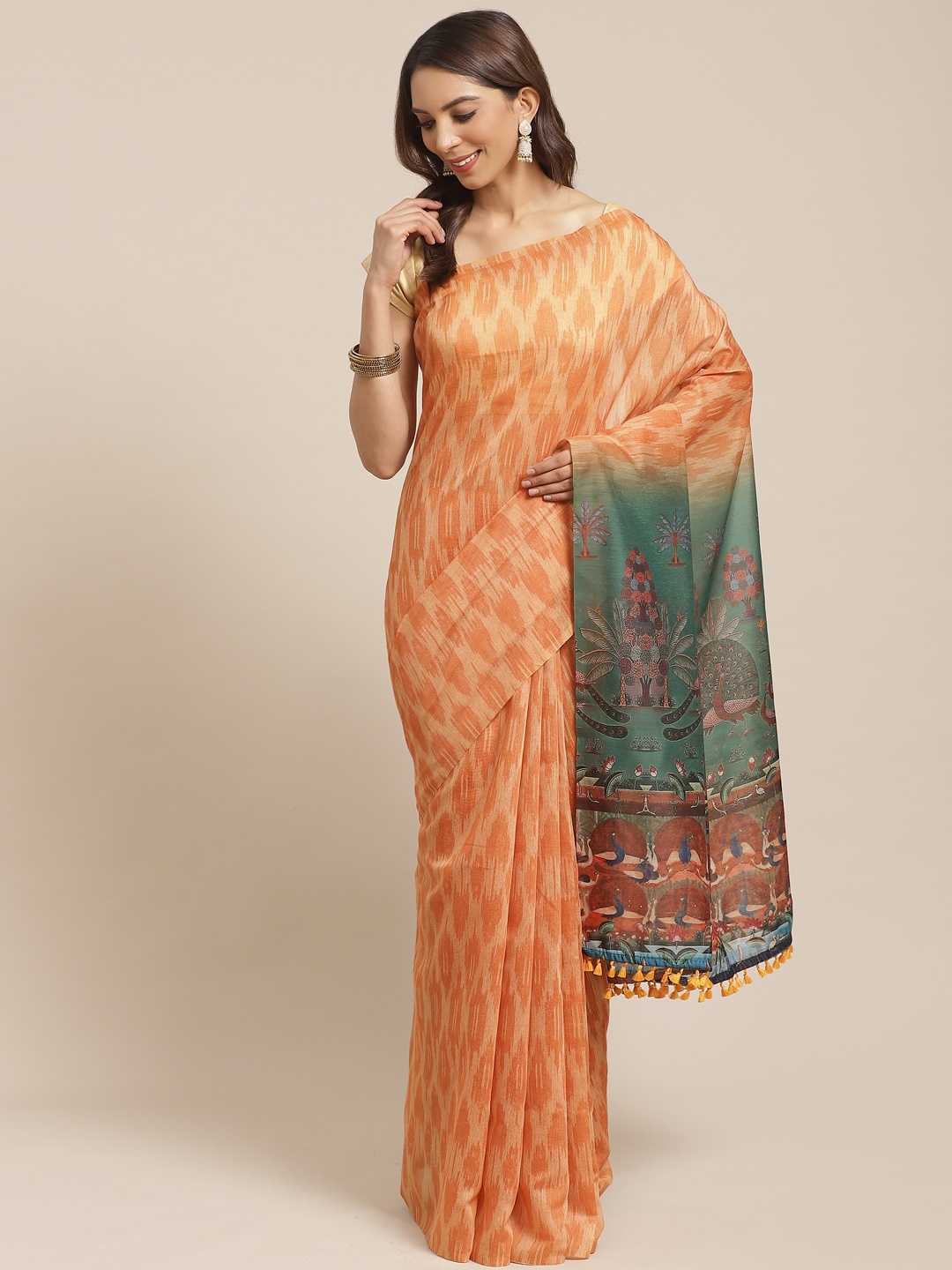 

Rajnandini Orange & Green Kalamkari Print Ikat Saree