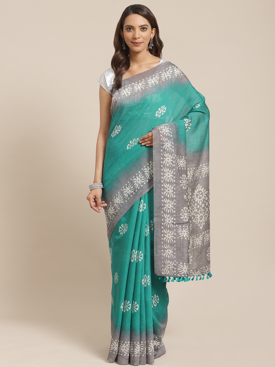 

Rajnandini Teal Green & Off-White Printed Dabu Saree