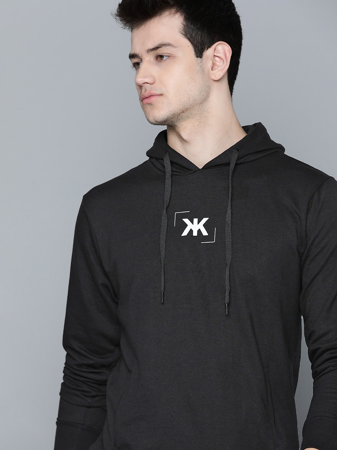 

Kook N Keech Men Black Solid Hooded Sweatshirt