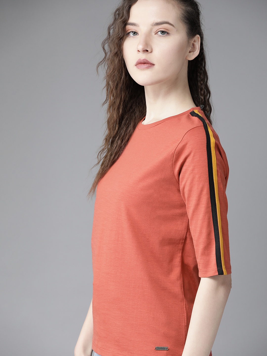 

Roadster Women Orange Solid Stripe Detail T-shirt