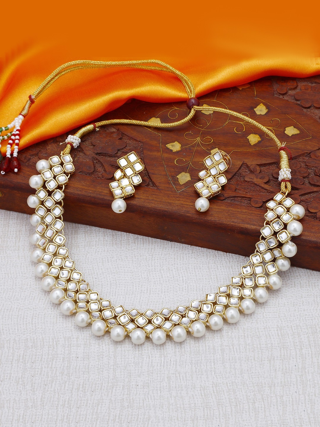 

Sukkhi Gold-Plated White Kundan-Studded Pearl Embellished Jewellery Set