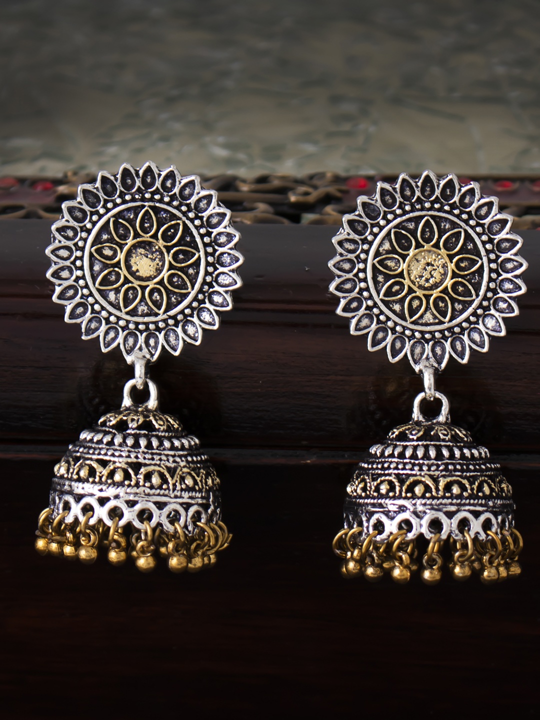 

Sukkhi Silver-Toned Dome Shaped Jhumkas