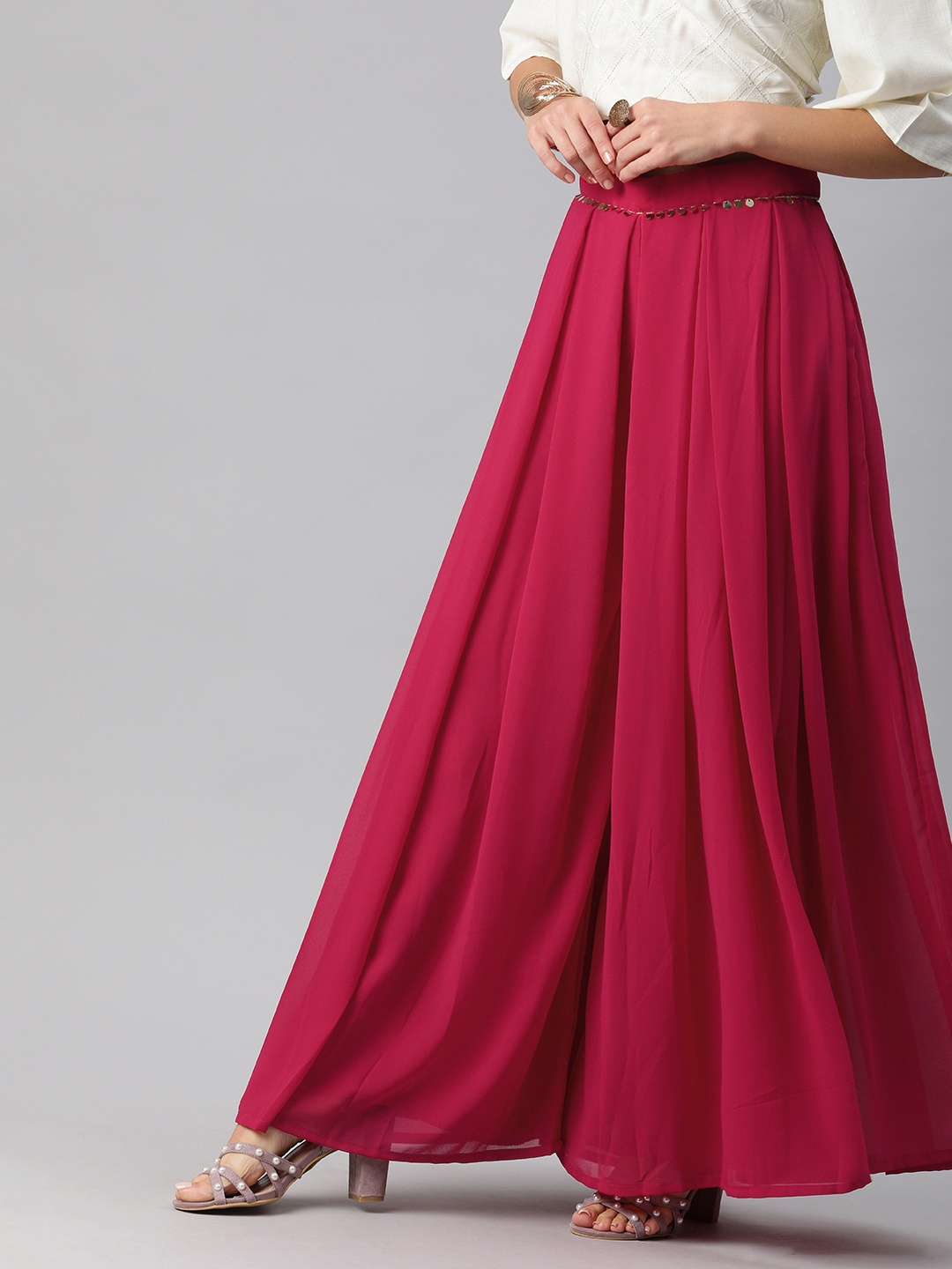 

Inddus Women Magenta Pink Solid Flared Palazzos with Sequinned Detail