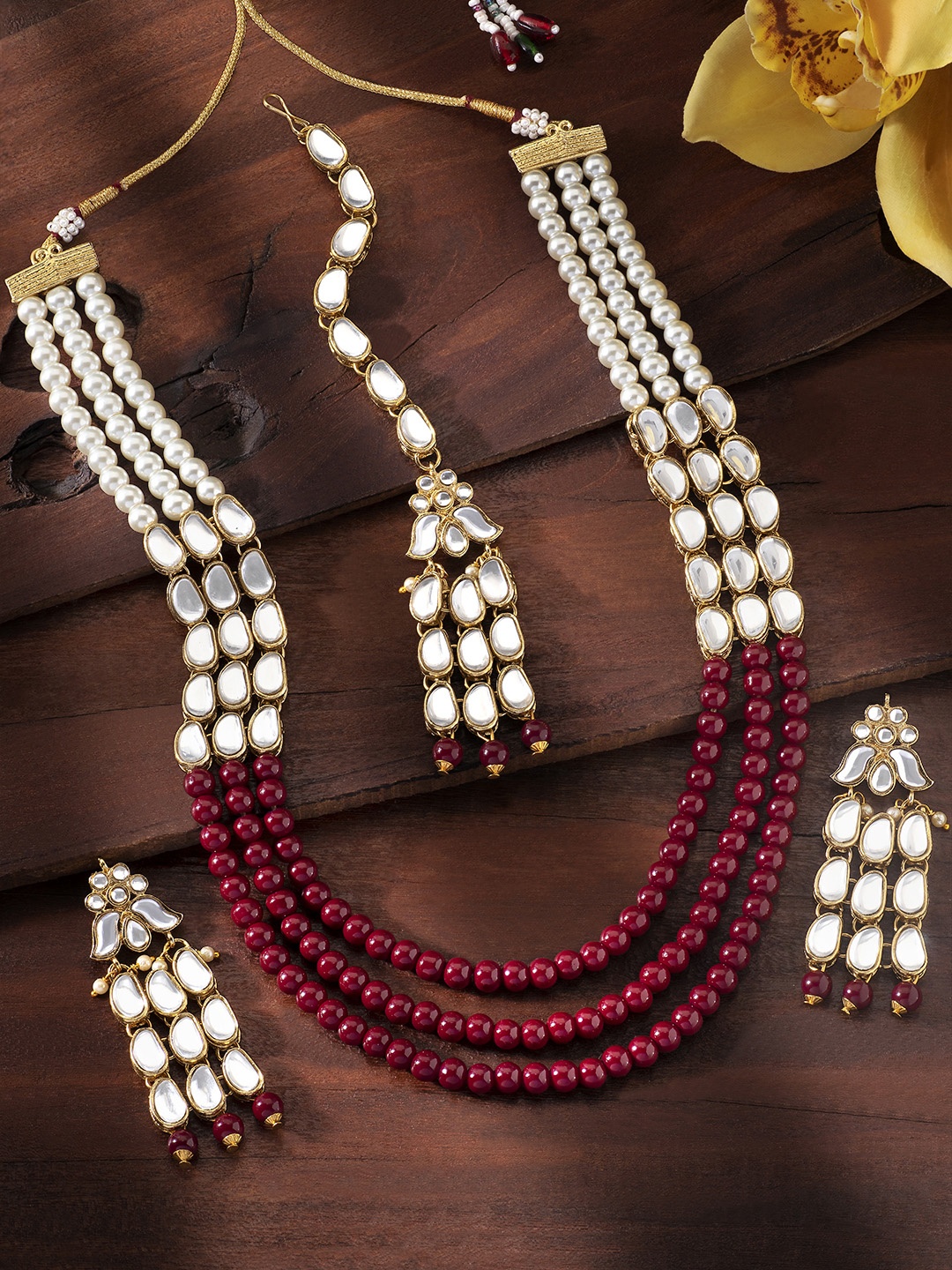 

Peora Women Red Gold-Plated Kundan Pearl Studded Jewellery Set, Maroon