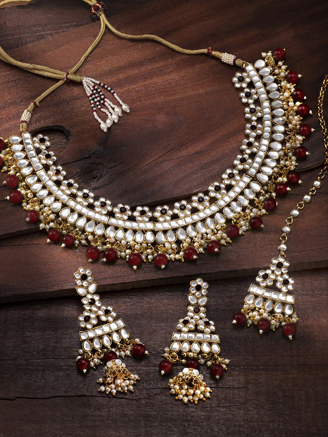 

Peora Gold Plated And Red Kundan Stone Studded Jewellery Set, Maroon