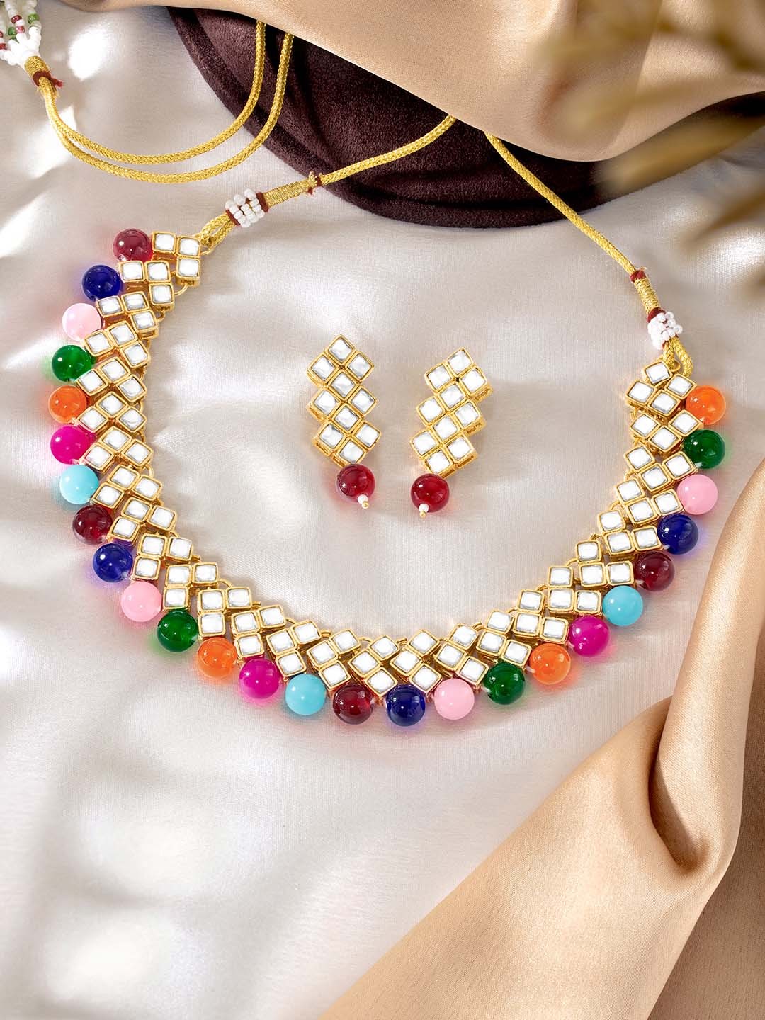 

Peora Gold Plated Kundan Stone Studded Jewellery Set