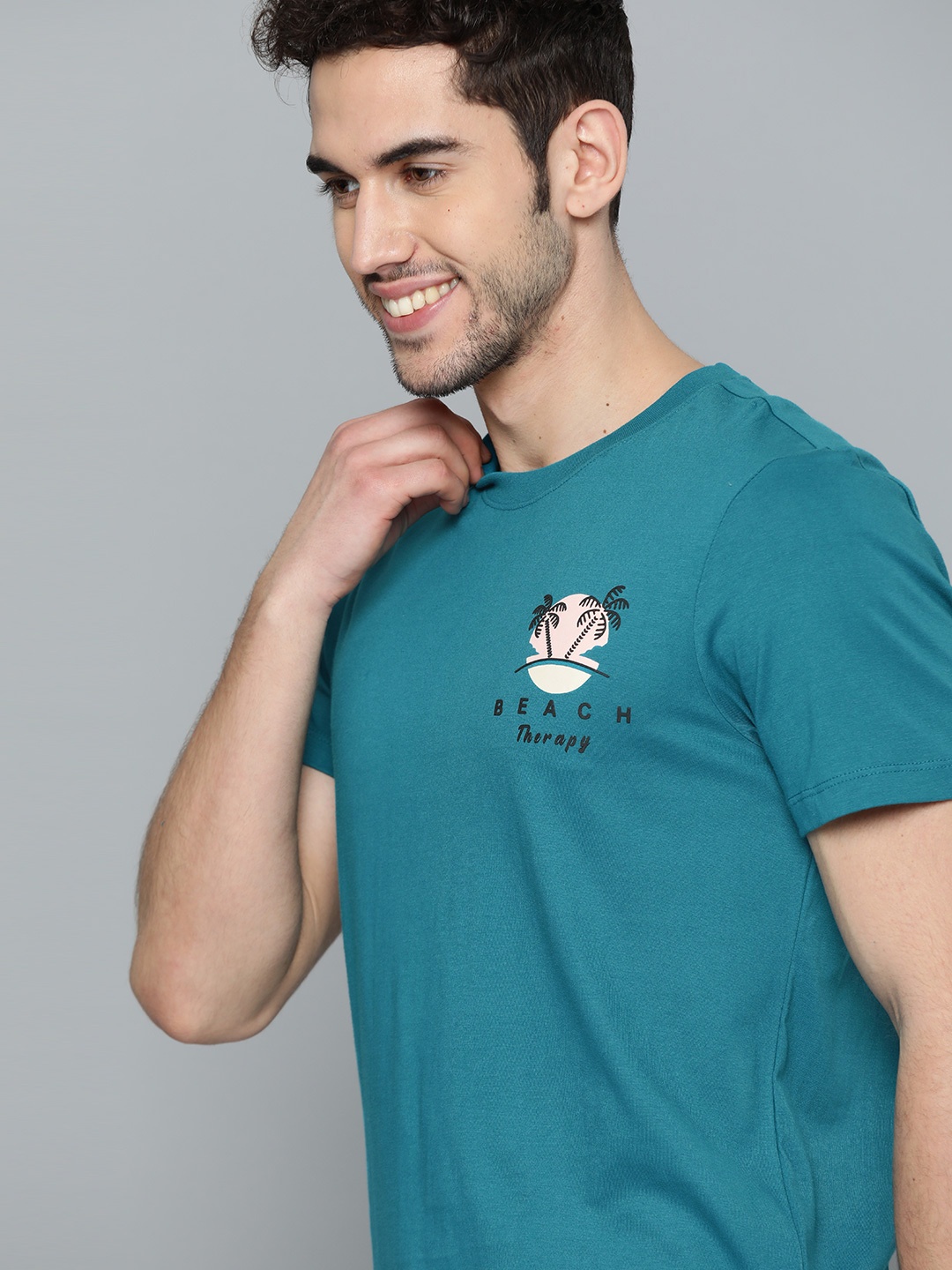 

Mast Harbour Men Teal Blue Solid Round Neck Pure Cotton T-shirt