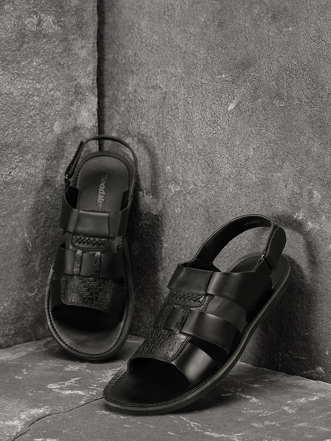 

Roadster Men Solid Black Comfort Sandals