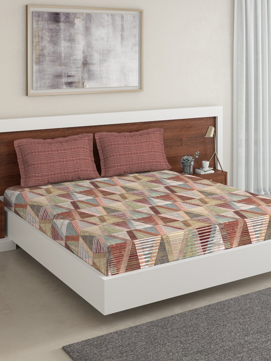 

DDecor Beige & Maroon Geometric 144 TC Cotton 1 Queen Bedsheet with 2 Pillow Covers