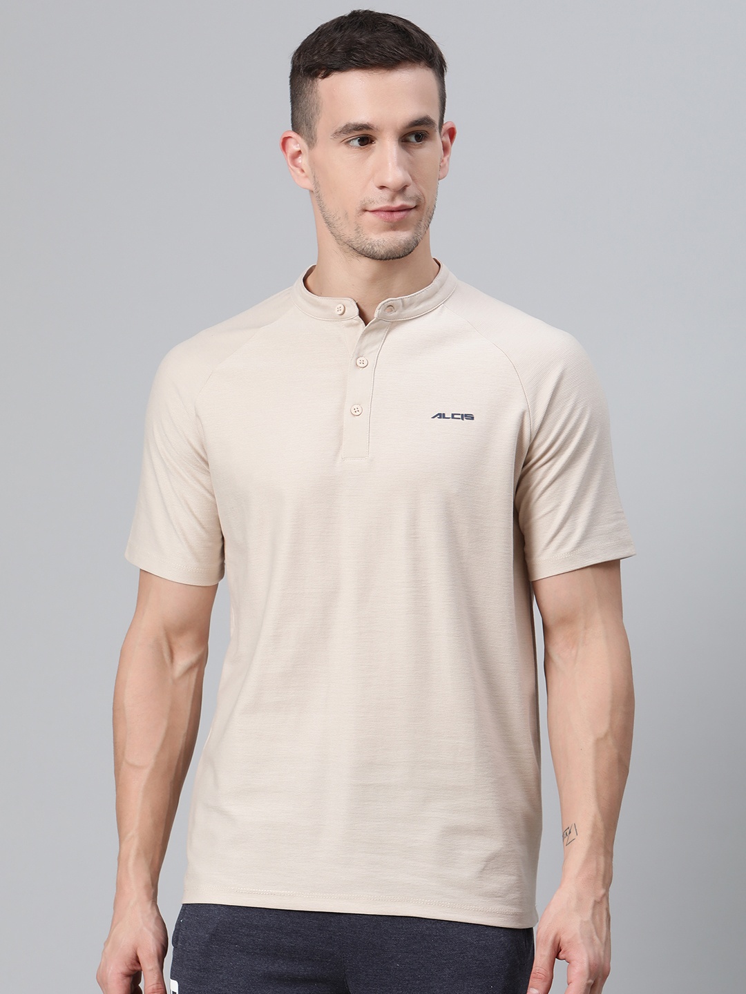 

Alcis Men Beige Solid Mandarin Collar Sports T-shirt
