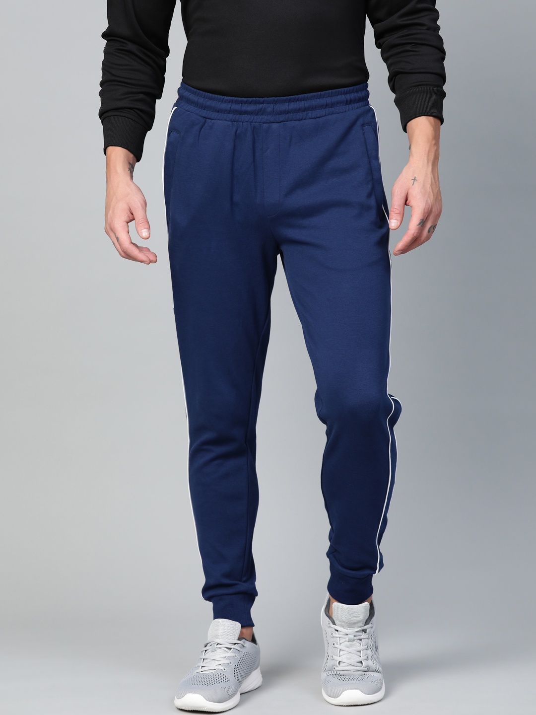 

Alcis Men Navy Blue Solid Joggers with Side Striped Detail