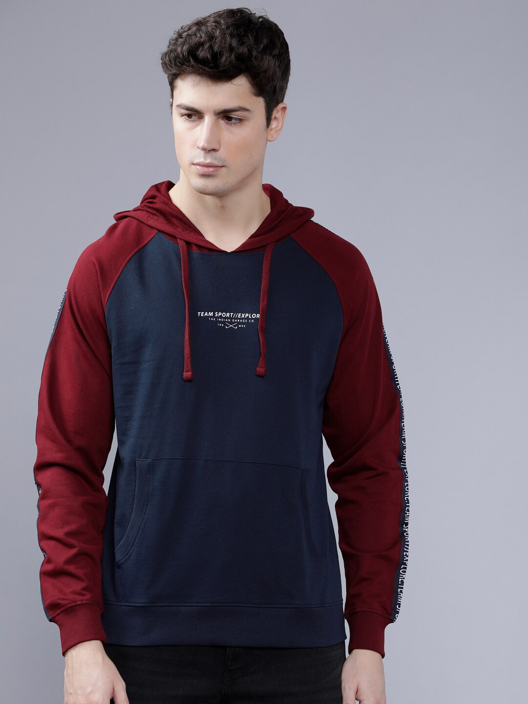 

The Indian Garage Co Men Navy Blue & Maroon Solid Hooded Sweatshirt