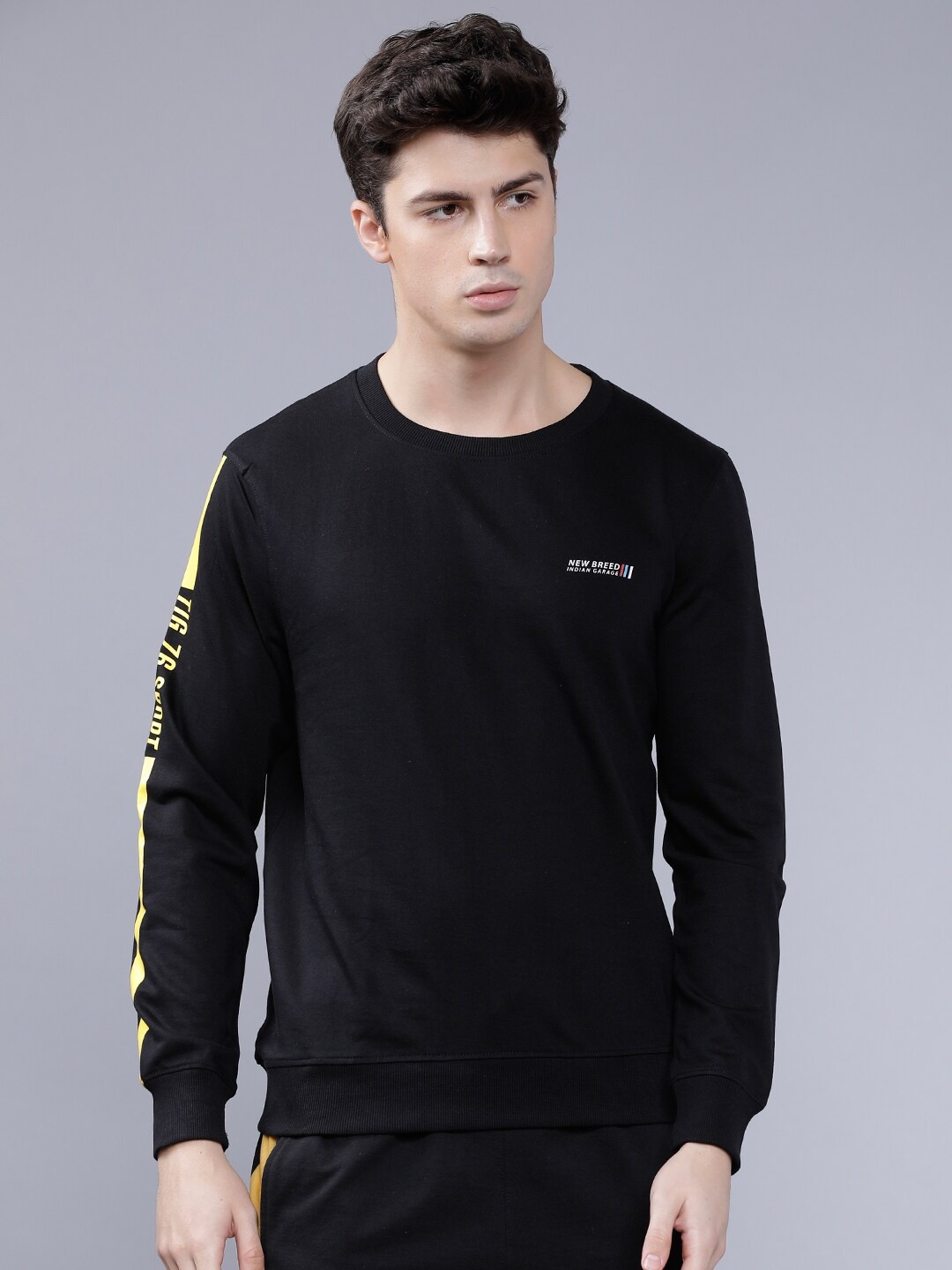 

The Indian Garage Co Men Black Solid Sweatshirt