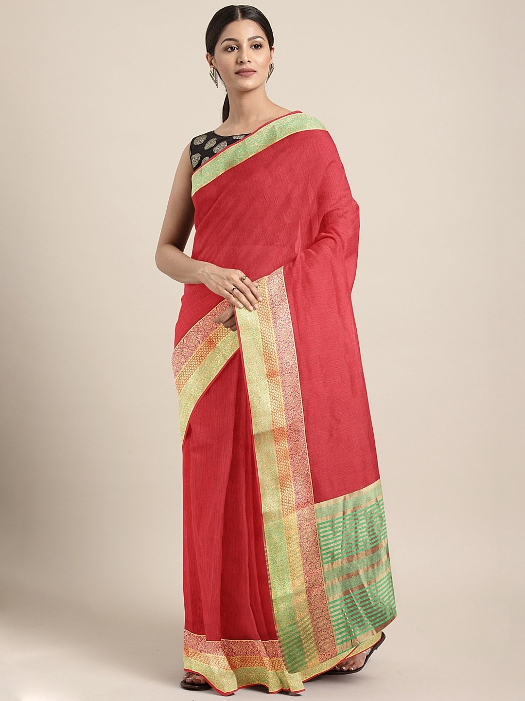 

Neerus Red Solid Silk Cotton Saree with Zari Border