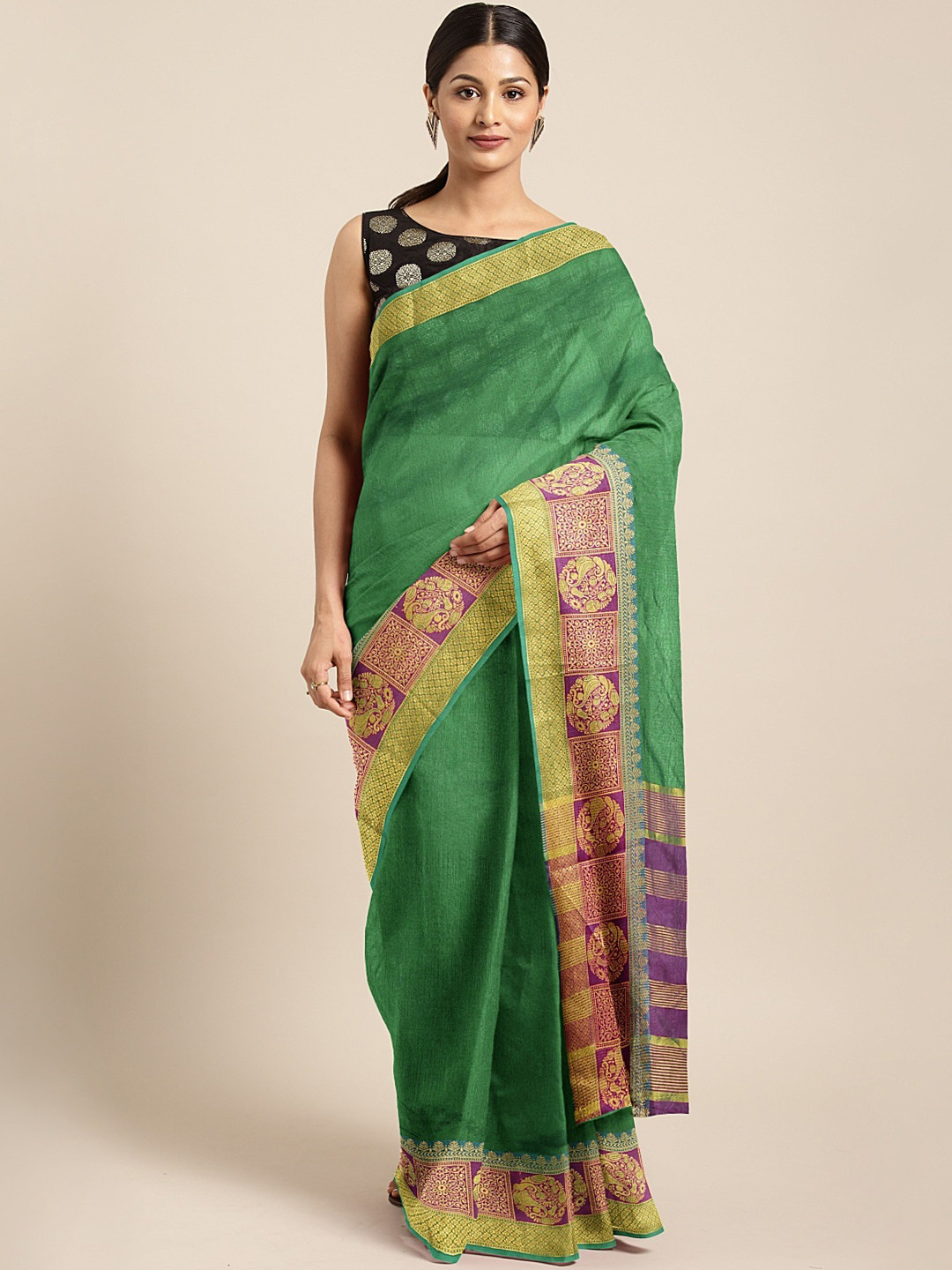 

Neerus Green & Purple Silk Cotton Solid Saree