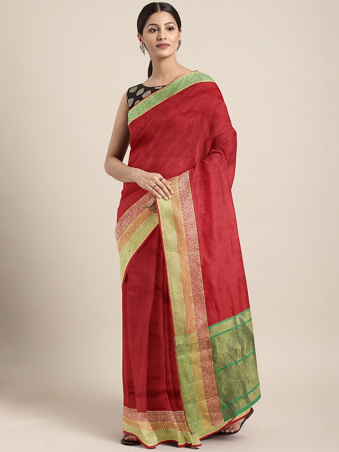 

Neerus Red & Green Silk Cotton Solid Saree