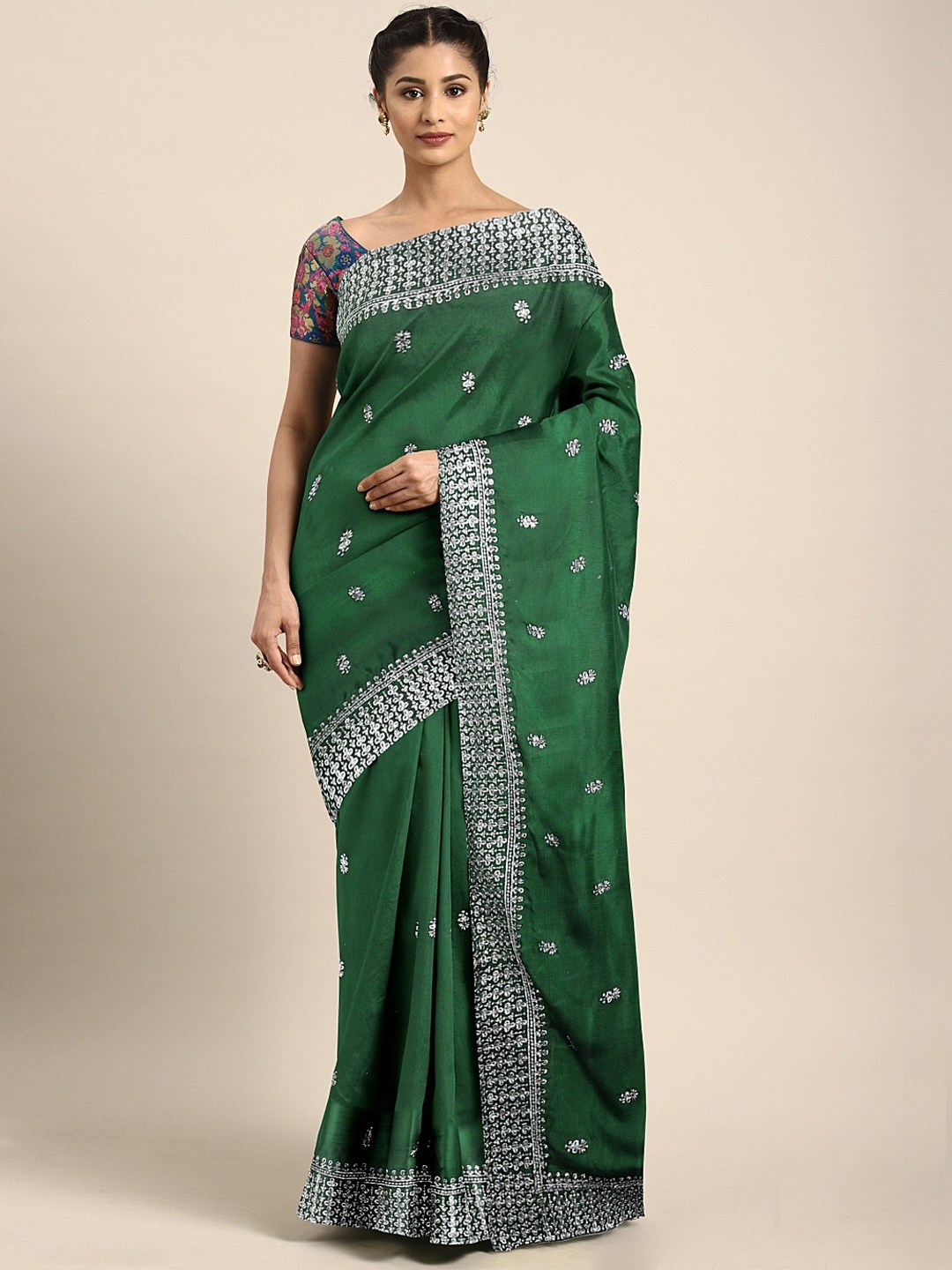 

Neerus Green & White Poly Crepe Embroidered Saree