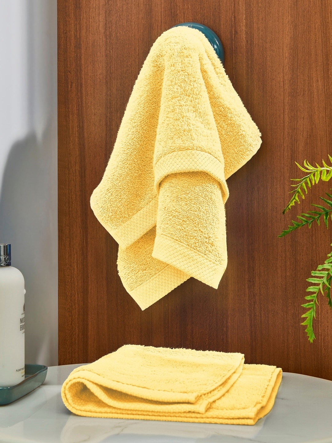 

DDecor Unisex Set Of 2 Yellow Solid 550 GSM Live Beautiful Hand Towels
