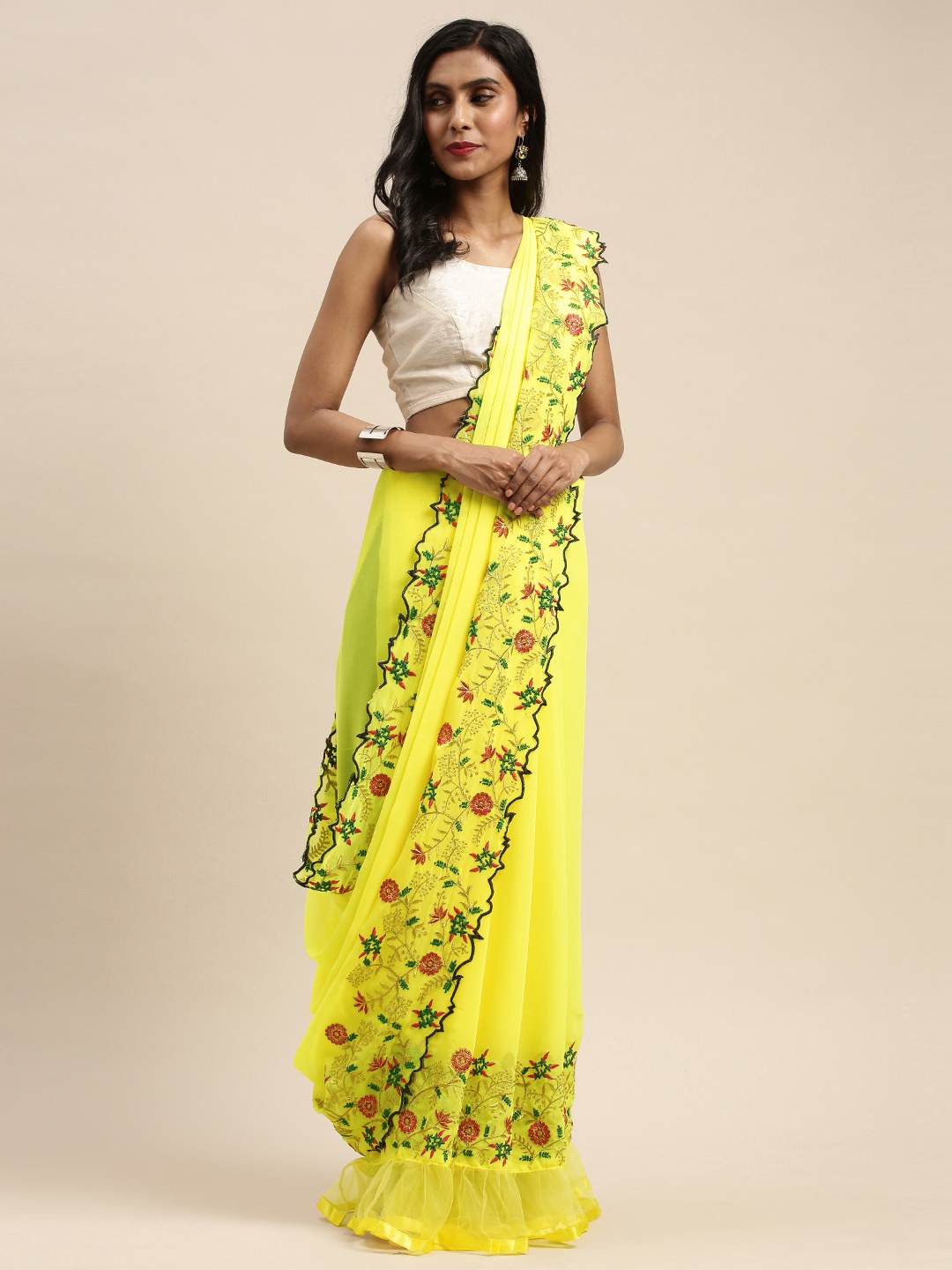 

Mitera Yellow Solid Poly Georgette Ruffled Saree