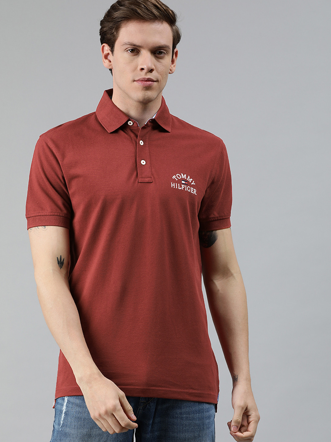 

Tommy Hilfiger Men Maroon Solid Polo Collar Pure Cotton T-shirt