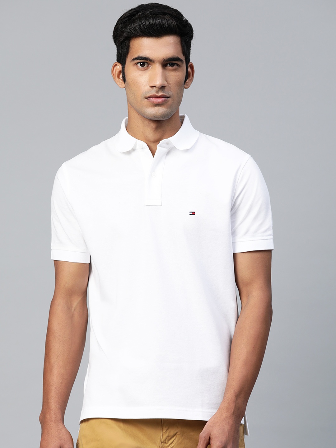 

Tommy Hilfiger Men White Solid Polo Collar T-shirt