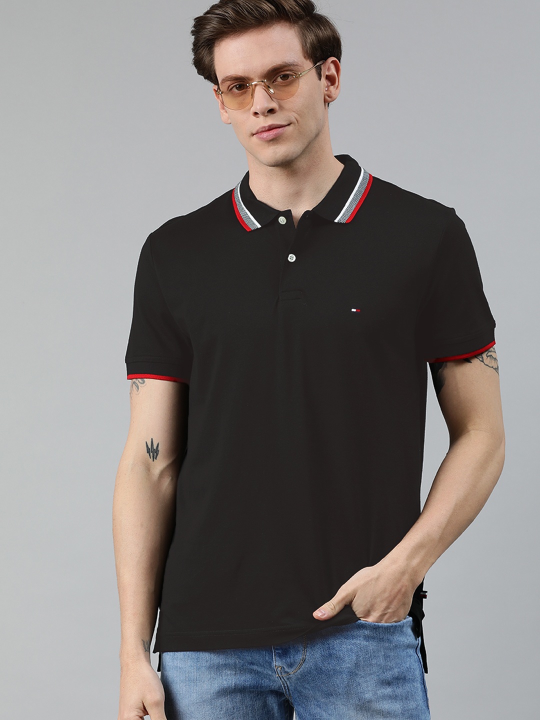 

Tommy Hilfiger Men Black Solid Polo Collar Pure Cotton T-shirt