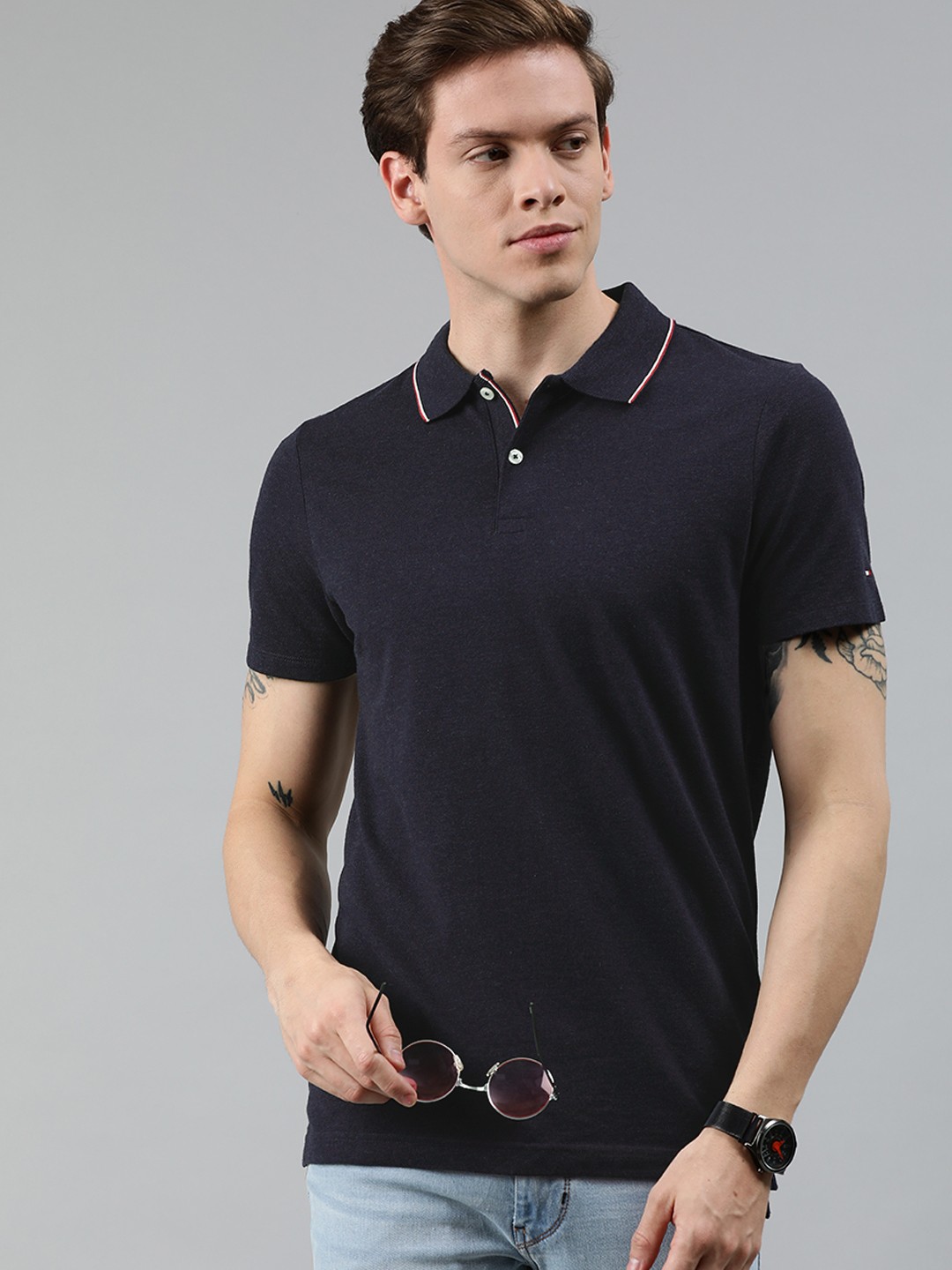 

Tommy Hilfiger Men Navy Blue Solid Polo Collar T-shirt