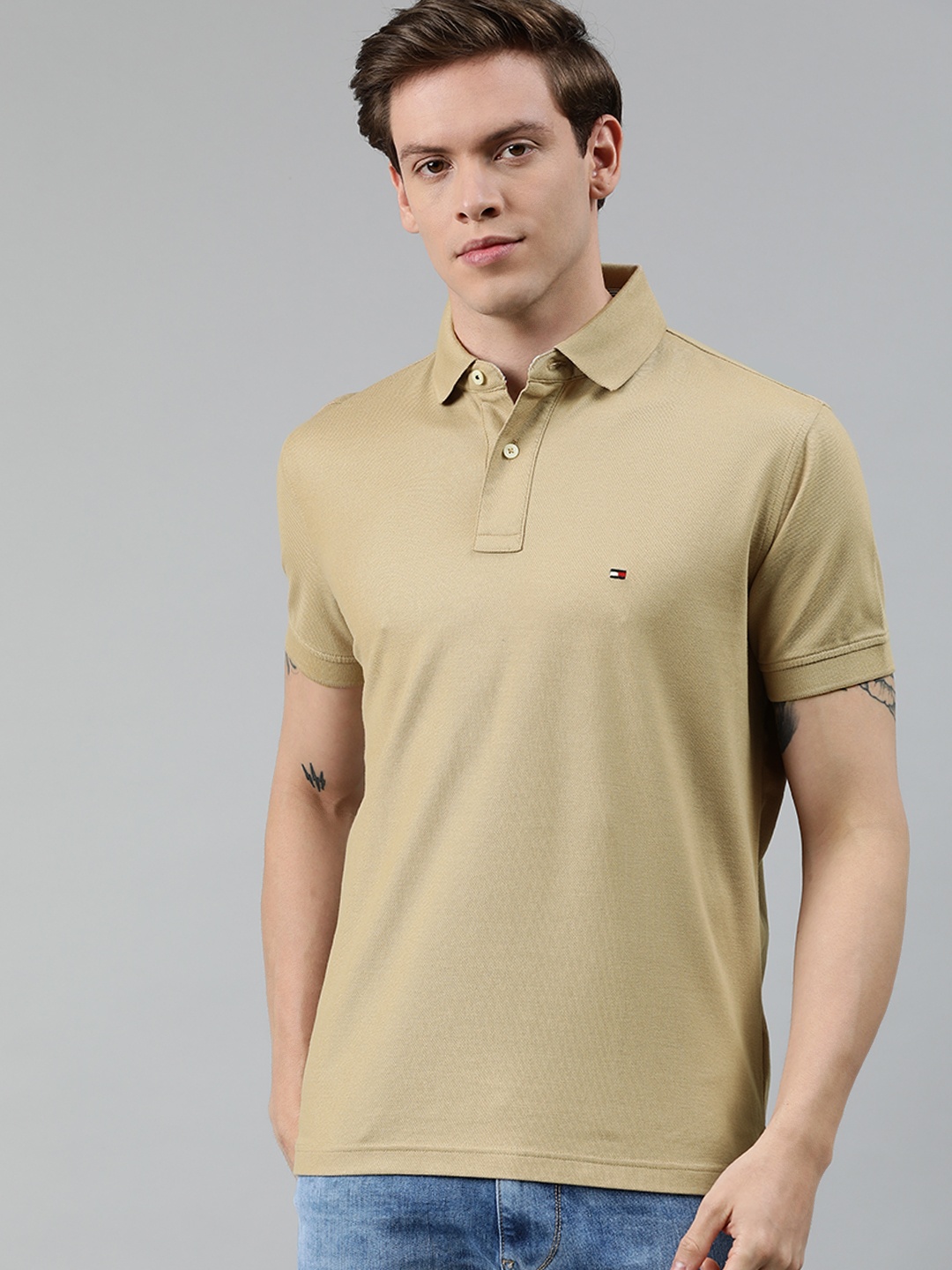 

Tommy Hilfiger Men Khaki Solid Polo Collar T-shirt