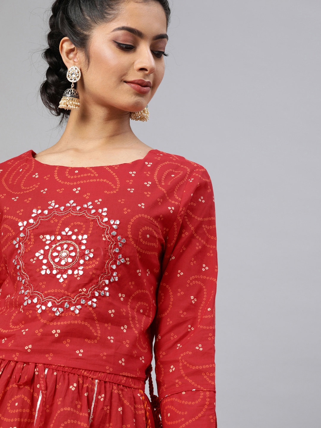 

Ishin Women Red Bandhani Printed Top with Skirt with Embellishment