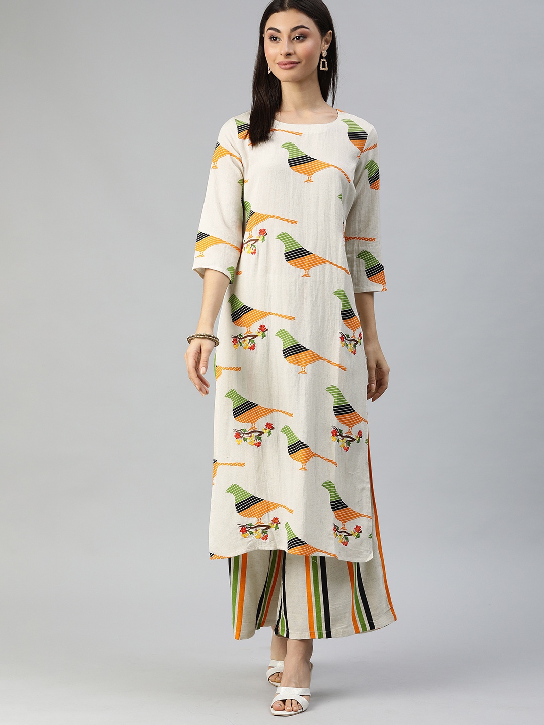

Ishin Women Off-White & Green Printed Kurta with Palazzos