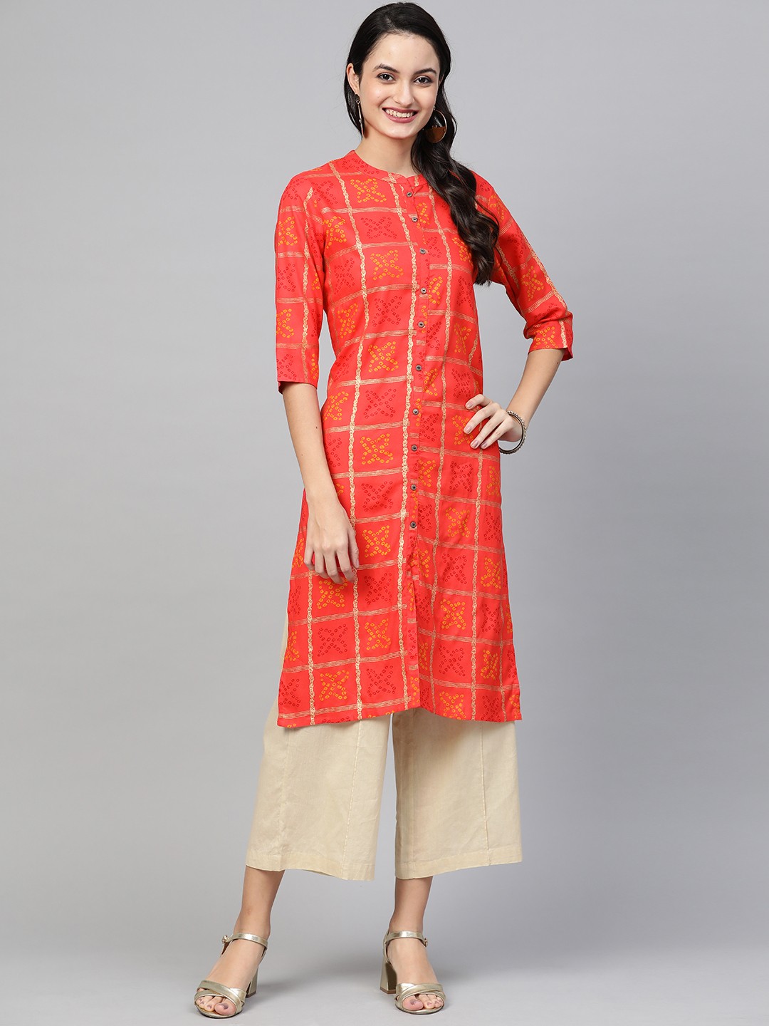 

Ishin Women Orange & Beige Bandhani Print Straight Kurta