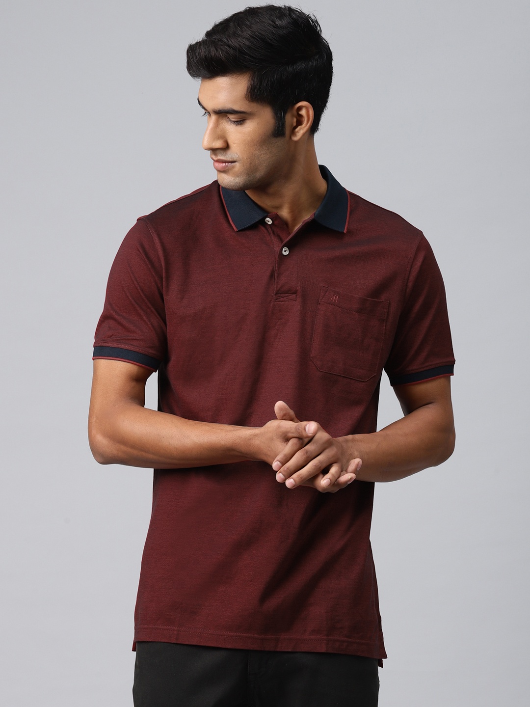 

Raymond Men Maroon Solid Supima Cotton Polo Collar T-shirt