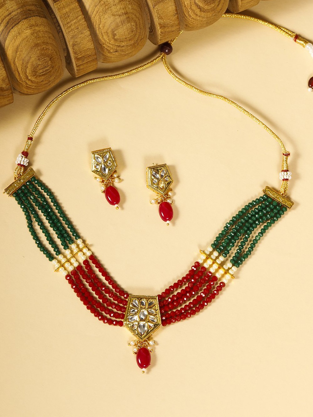 

Priyaasi Red & Green Gold-Plated Stone Studded & Beaded Handcrafted Jewellery Set