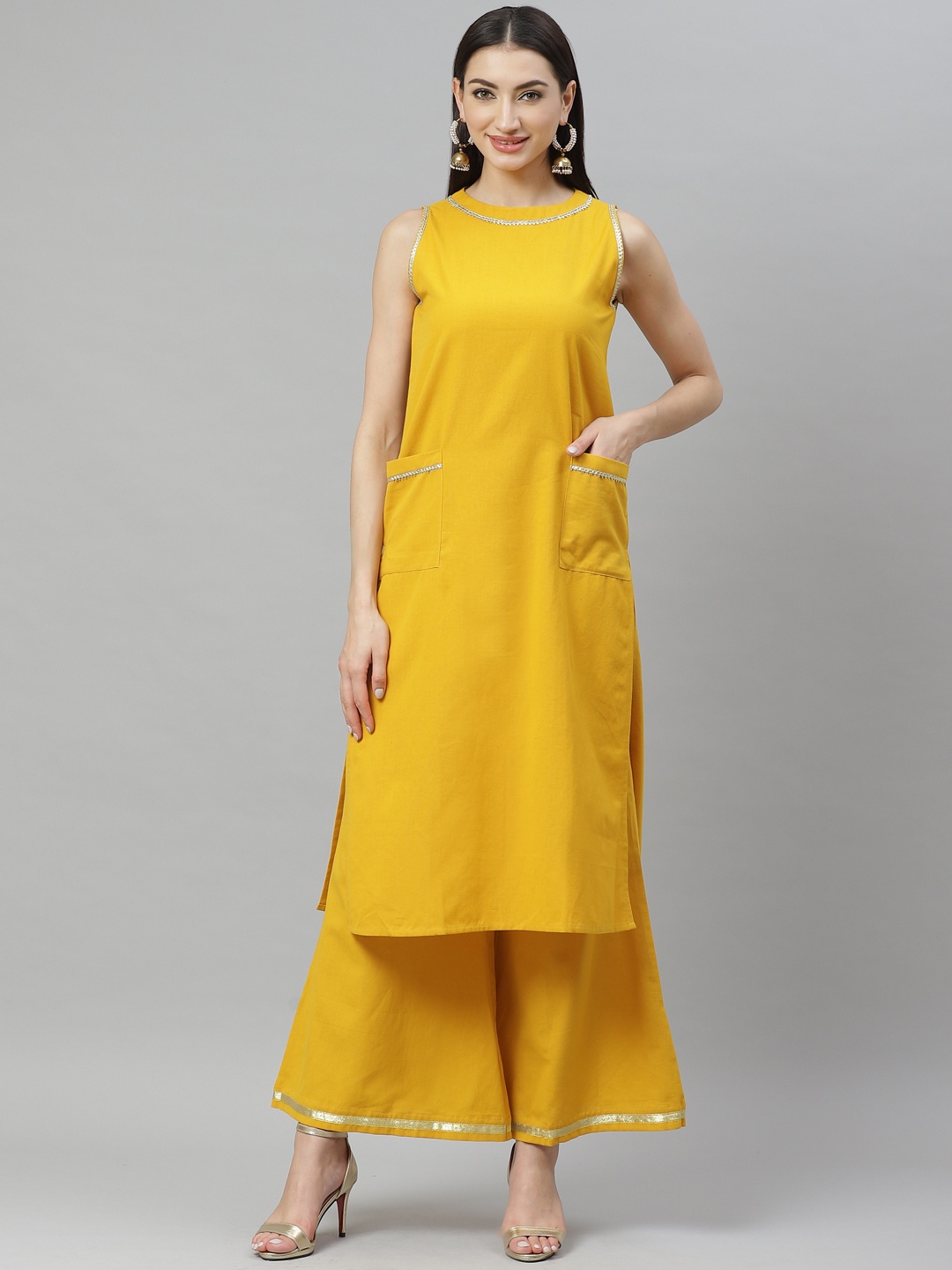 

Myshka Women Mustard Yellow & Silver Solid Kurta with Palazzos