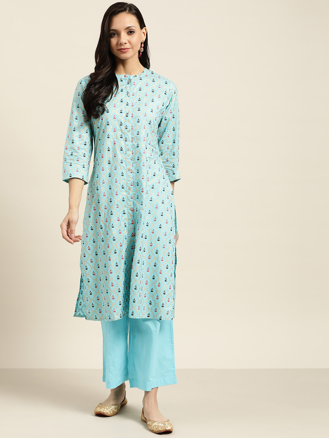 

Sangria Women Blue & Golden Cotton Printed Kurta with Palazzos