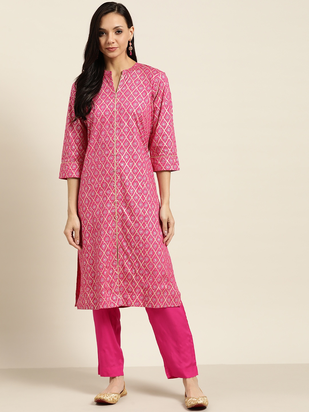 

Sangria Women Pink & Golden Printed Kurta with Trousers