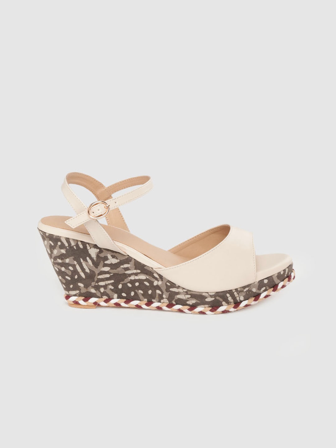 

Taavi Women Beige Solid Open Toe Wedges