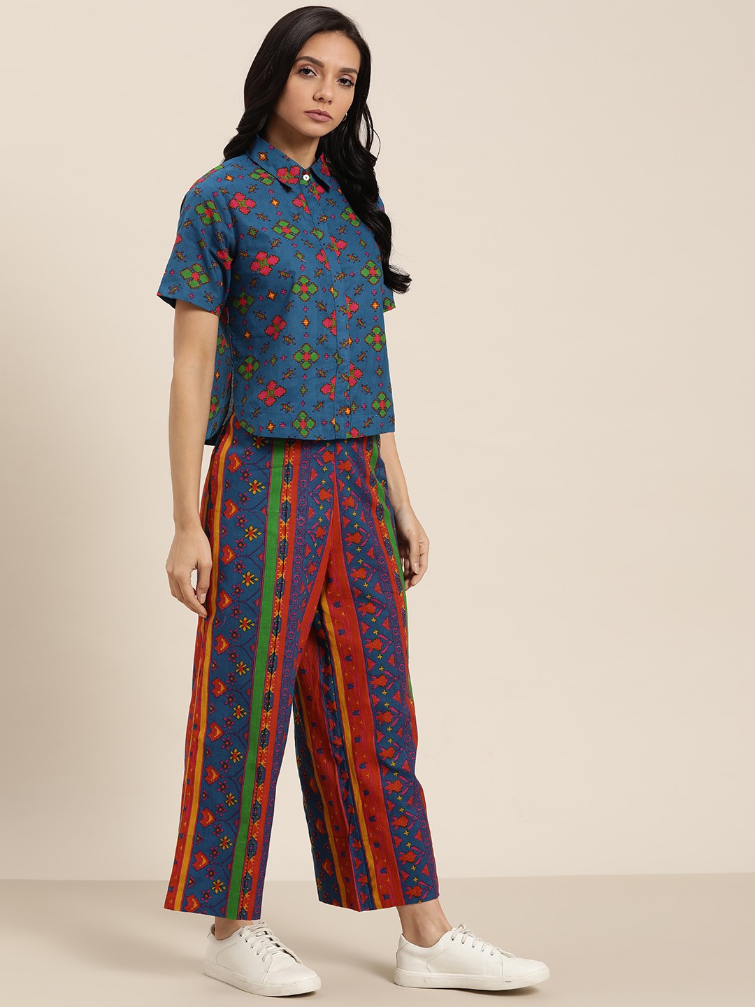 

Sangria Women Blue & Orange Printed Shirt with Palazzos