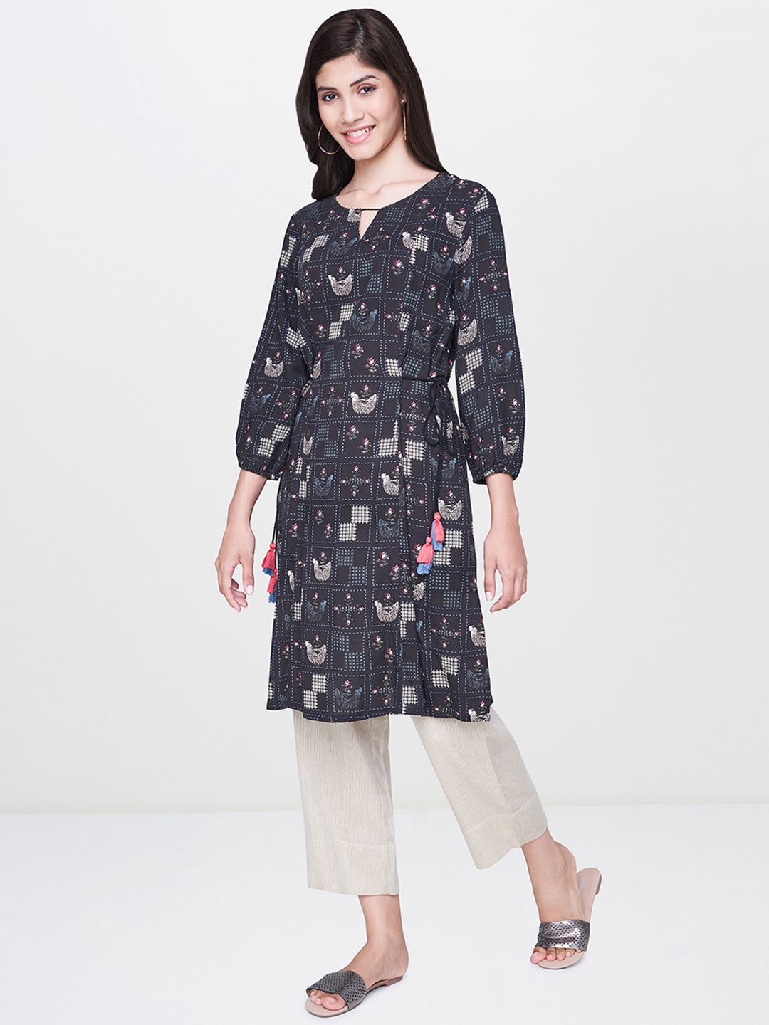 

Global Desi Women Black & Off-White Printed Straight Kurta with Tie-Up Detail