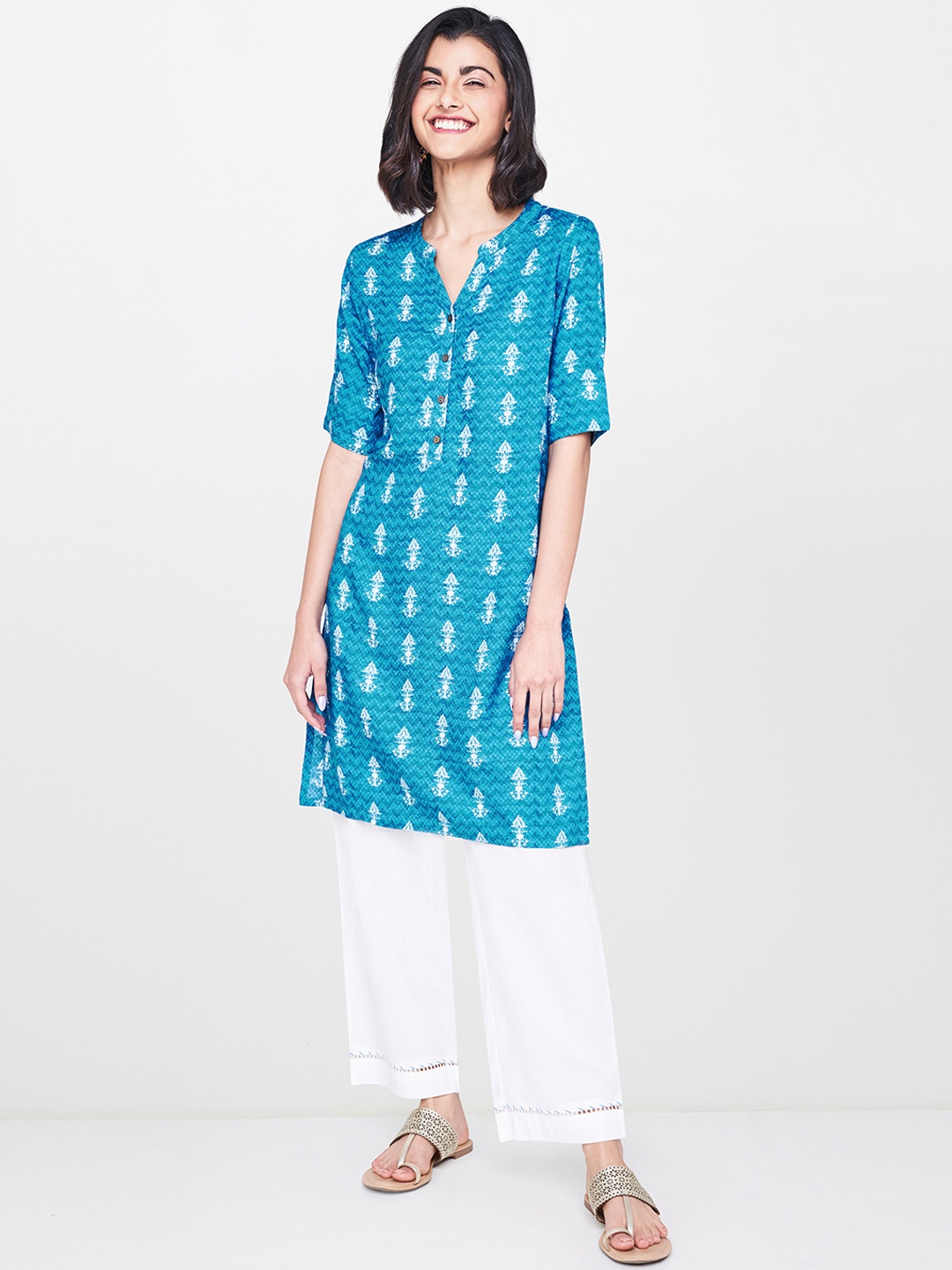 

Global Desi Women's Blue & White Printed Tunic